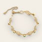 Cascade Linked Bracelet with Tsavorite Garnets in 18k Yellow Gold