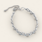 Flowing Cadence Bracelet with Blue Zircons in 18k White Gold