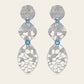 Extended Cracked Earth Dangle Earrings with Blue Zircons in 18k White Gold