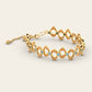 Flowing Cadence Bracelet with Blue Zircons in 18k Yellow Gold