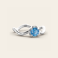 The Curve Ring with Blue Zircon in 18k White Gold