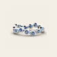 The Eternity Curve Ring with Blue Sapphires in 18k White Gold