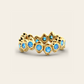 Double Cadence Eternity Ring with Blue Zircons in 18k Yellow Gold
