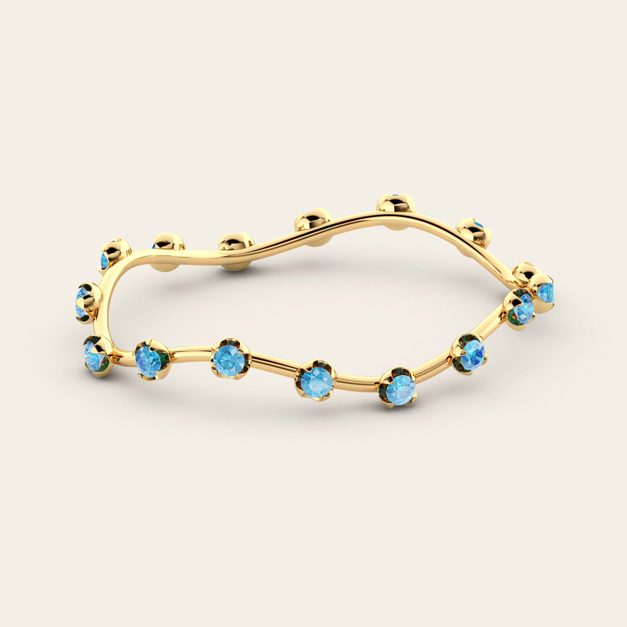 The Curve Bangle with Blue Zircons in 18k Yellow Gold