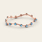 The Curve Bangle with Blue Zircons in 18k Rose Gold